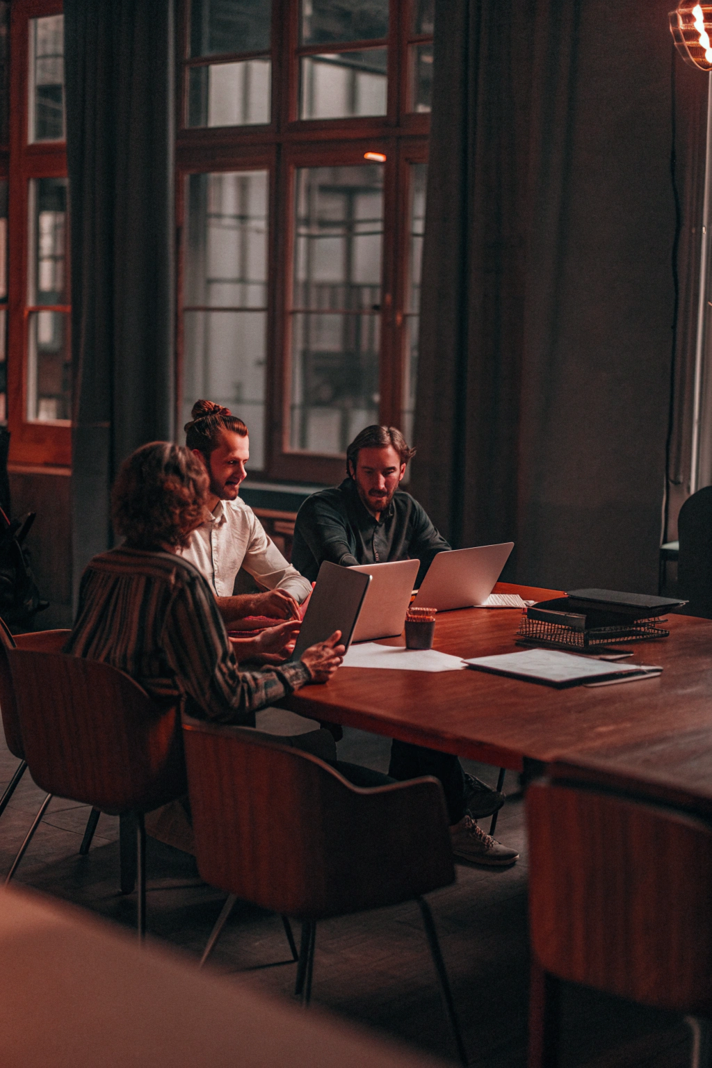 The SEO development team discusses the client's promotion strategy.